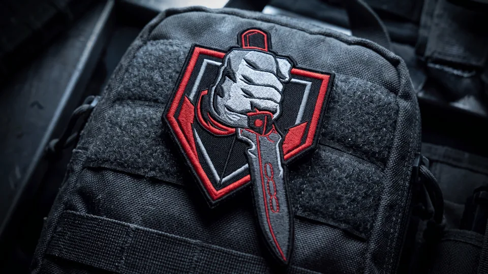 Modern Warfare 4 perk and loadout artwork with military equipment laid out on a table